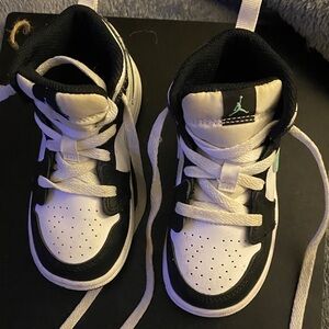 Jordan Kids Black and White High-Top Sneakers